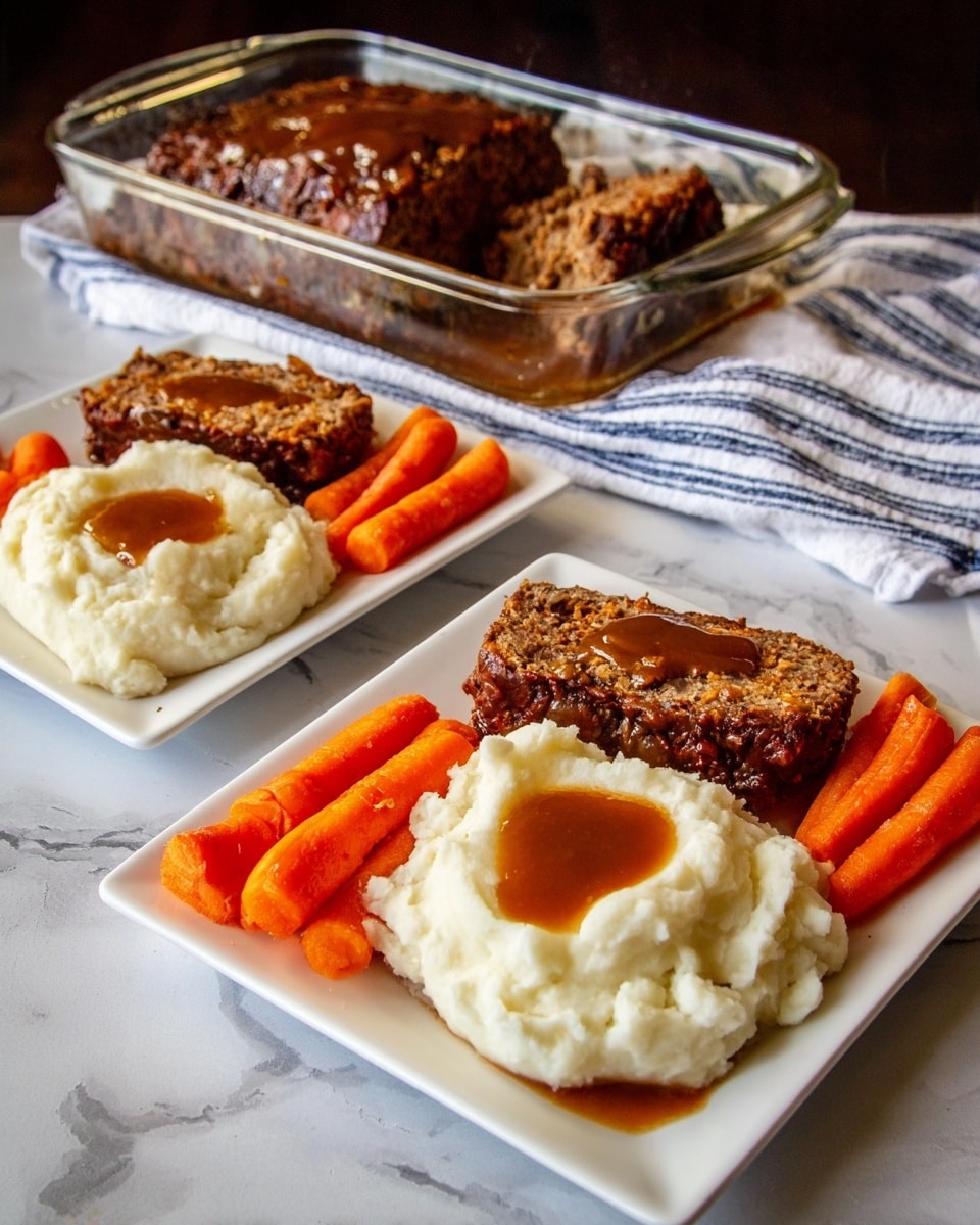 Two white square plates are shown on a white marble textured surface, each plate having three sections of food. One section holds a thick slice of meatloaf with a dark brown, slightly glazed top and visible bits of vegetables inside. Another section has mashed potatoes with a smooth texture topped with brown gravy in the center. The last section contains bright orange cooked carrot slices piled neatly. Behind the plates, a glass baking dish with more meatloaf covered in sauce rests on a white and blue checked cloth. Photo taken with an iphone --ar 4:5 --v 7