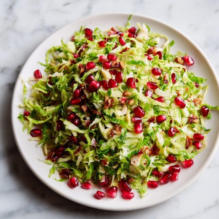 Christmas Salad with Brussels Sprouts, Kale, Pomegranate, and Citrus Vinaigrette Recipe