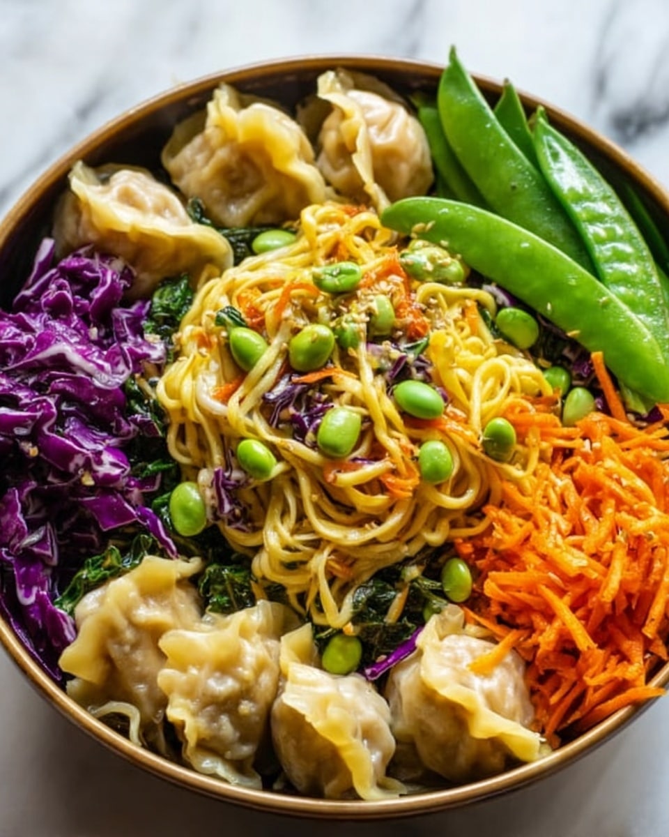 The image shows a white bowl filled with several layers of food. At the bottom, there is a bed of bright purple shredded cabbage and green leafy vegetables. On top of the greens, there are lightly browned dumplings placed around the edges. In the center, there is a mound of light yellow noodles mixed with orange carrot strips, green edamame beans, and bits of browned crispy topping. A few snap peas rest on one side, adding a fresh green color. The bowl sits on a white marbled surface. photo taken with an iphone --ar 4:5 --v 7