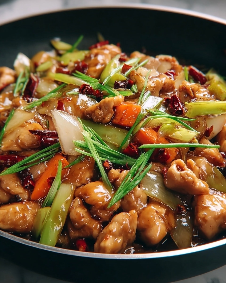 A close-up view of a dish in a white bowl placed on a white marbled surface, showing three main layers: the bottom layer is light green and pale yellow cooked cabbage pieces with a slightly glossy texture; the middle layer is bright orange thin carrot strips mixed evenly throughout; the top layer has small golden-brown battered and fried chicken pieces coated with a shiny sauce, sprinkled with white sesame seeds, and topped with chopped green onions scattered on top, adding a fresh vibrant green color, photo taken with an iphone --ar 4:5 --v 7